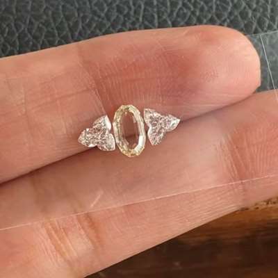 0.46ct Natural Light Yellow (U-V range ) VVS2 clarity Oval Portrait cut Diamond with 0.50ct Matching pair of FG color VS-SI clarity Flower shape Diamond Layout for Ring