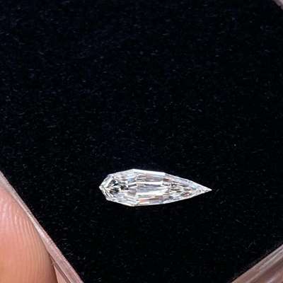 0.40cts GIA certified Natural G color VVS2 clarity super long step cut pear shape diamond