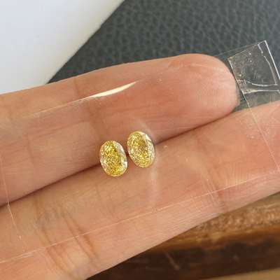 0.74ct Pair of Natural Fancy Yellow VS2 clarity Oval shape Diamonds