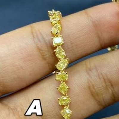 Natural Fancy Yellow Mix Shape Tennis Bracelet in 18K Yellow Gold!