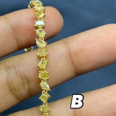 Natural Fancy Yellow Mix Shape Tennis Bracelet in 18K Yellow Gold!