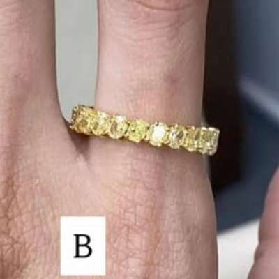 Natural Yellow colour Oval shaped diamonds set in 18 K gold eternity ring