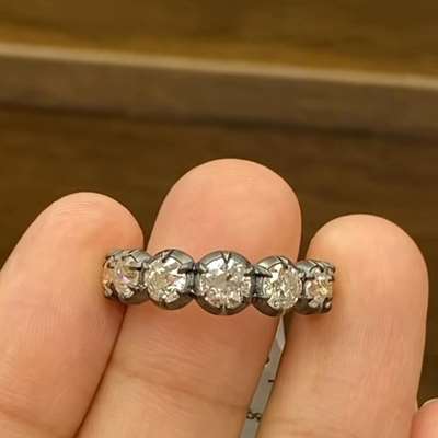 7 stone ring using genuine vintage old miner & Old European cut diamonds set in 18k gold. 