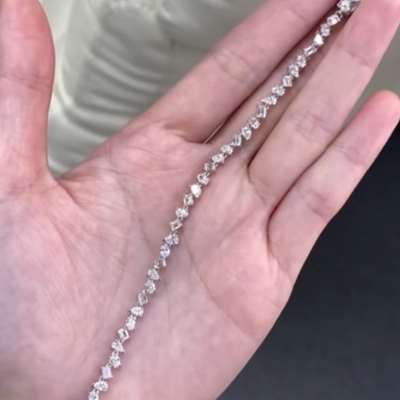 3.53ct total weight Mixed shaped diamonds set in 18k white Gold tennis bracelet