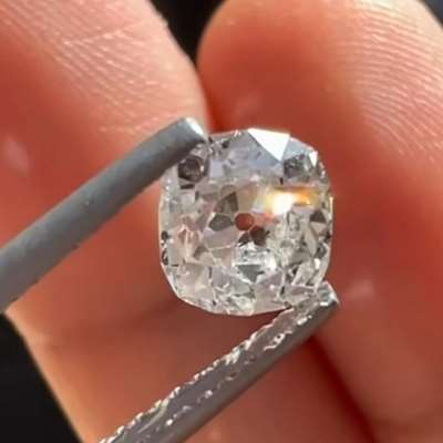 A 0.94ct Genuine Vintage with VS clarity Old Miner Cut diamond. 