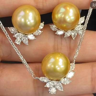 Beautiful South Sea Elegant Pearls set with White diamonds set in 18 K Gold Earrings and matching Necklace set now available for SALE