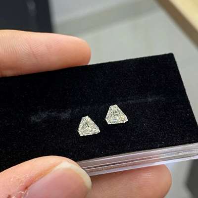 0.66ct Total Weight Matching Pair of Natural MN Colour VS Si Clarity Fancy Shield Shaped Diamonds