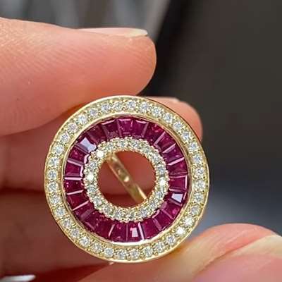 Natural Pink sapphire gemstones with white diamonds set in 18 K Yellow gold ring