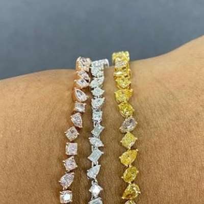 5.93ct total (48 stones!) of natural mixed-color diamonds in 18K yellow gold—warm, vibrant,