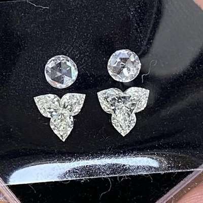 0.63cts total weight pair of natural J color vs-si clarity flower shape Diamonds paired with 0.38cts total weight fg color vs1 clarity round Rosecut diamond layout