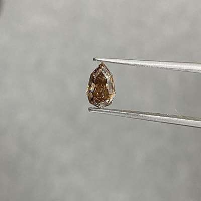 1.01ct natural fancy brown color VS1 clarity step cut pear shape diamond