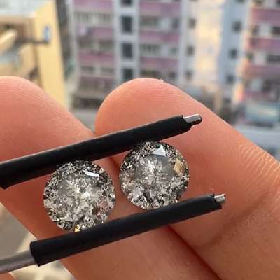 1.66ct and 1.70ct round salt and pepper natural diamknd pair