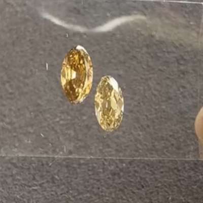 0.44 & 0.44cts Natural Honey Brown and champagne brown VS-SI Clarity Moval shape Diamond layout 