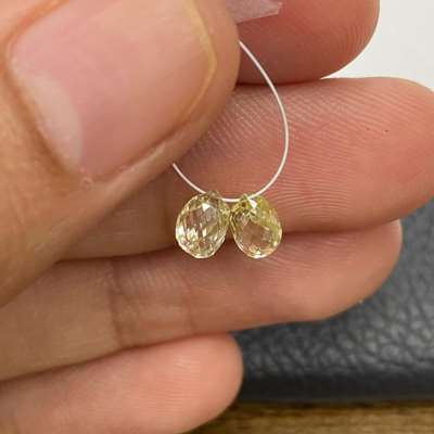 1.36ct Total Weight Matching Pair Of Natural Light Yellow Briolette Shape Diamonds