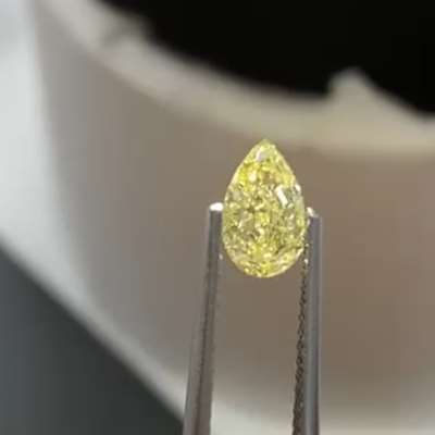 0.66ct GIA Certified Natural Fancy Light Yellow SI1 Clarity Eyeclean Pear Shape Diamond