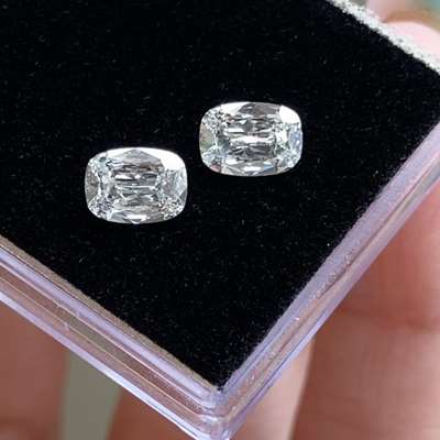 0.55cts & 0.55cts Pair of Natural J color VVS1 & VVS2 long old cut cushion shape diamonds 