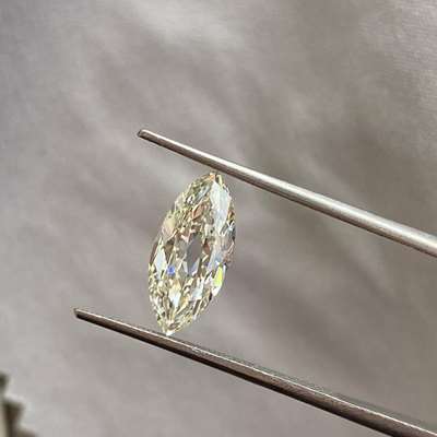 2.06ct Natural Fancy Light Brownish Yellow Old Cut Marquise Diamond, featuring VS2 clarity.