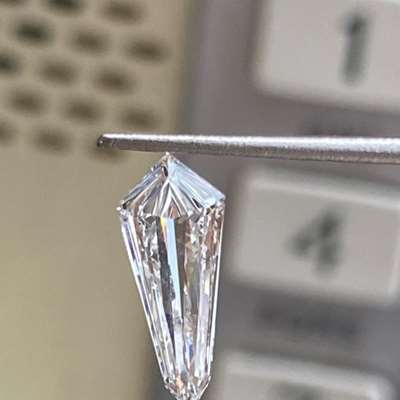 0.80ct GIA Certified natural G color VS1 clarity step cut kite shape diamond. 