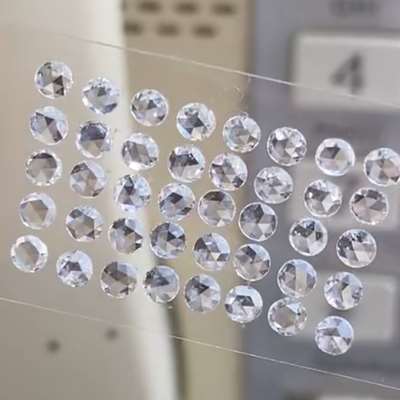 layout of 40 Natural Round Rosecut Diamonds, totaling 1.83cts, in GH color and VS-SI clarity.