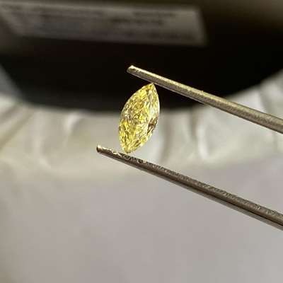 0.29ct natural Fancy Light Yellow marquise shape diamond, featuring an SI1 clarity.