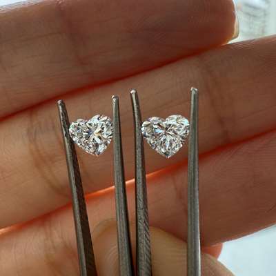 0.41cts & 0.40cts GIA certified Natural E color VVS1 heart shape diamond pair
