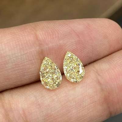 1.15ct & 1.16ct GIA Certified Matchig Pair Of Natural Light Yellow (w to x & y to Z range) VS2 & VVS1 Clarity Pear Shape Diamonds