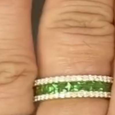 Invisible setting 3/4th eternity ring with white diamonds around in 14k gold. Tsavorite eternity ring: