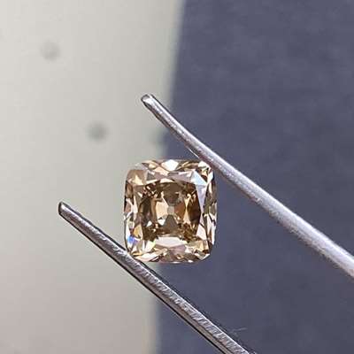 This enchanting 1.06ct brown SI1 clarity old cut cushion shape diamond is a true gem.