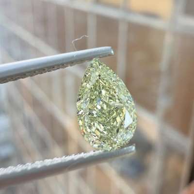 1.03ct GIA-certified natural fancy grayish-greenish yellow pear shape diamond. 