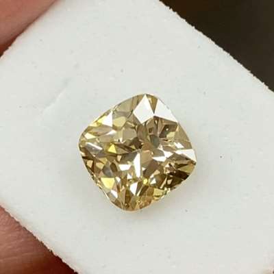 stunning 2.23ct GIA Certified Natural Fancy Brownish-Yellow Diamond, featuring SI1 clarity and a beautiful Cushion shape.