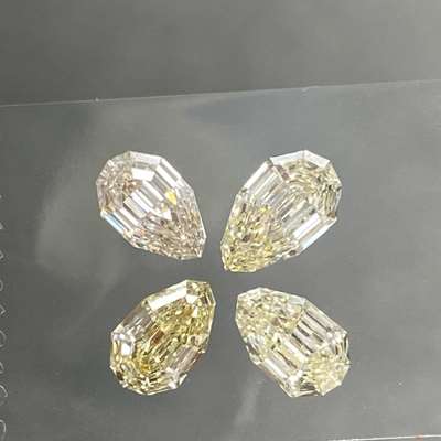 2.67cts Total weight 4pcs Natural light yellowish brown VVS2 clarity step cut pear shape diamonds