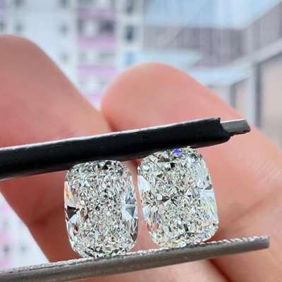 1.01ct & 1.01ct GIA Certified Matching Pair Of Natural H Color VS2 Clarity Long Cushion Cut Diamonds