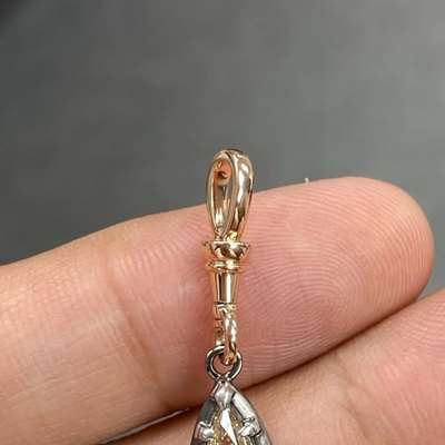 1.01ct GIA Certified Natural S to T Range Light Brown VS1 Clarity Old Cut Pear Shape Diamond Set In 18k Vintage Pendant setting.