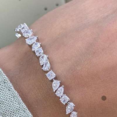 Natural white Mix Shape Tennis Bracelet In 18k white Gold.