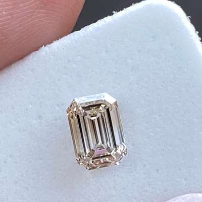 1.02cts Natural peachy brown vs1 clarity emerald shape diamond