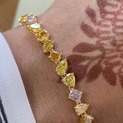 Gorgeous mix fancy color mix fancy shape diamond bracelet in 18k gold