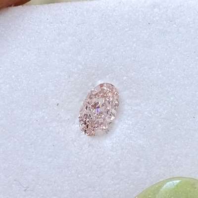 0.30cts GIA certified Natural Fancy light Orangy pink vs1 clarity oval shape diamond