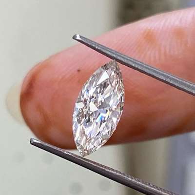 0.82cts Natural N color, faint brown vs1 clarity marquise shape diamond