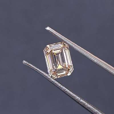 1.00cts Natural peachy brown vs1 clarity emerald shape diamond