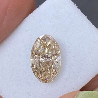 2.03cts Natural light peachy brown VS2 clarity long Oval shape diamond