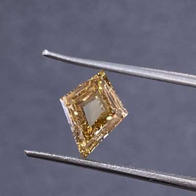 1.51cts Natural peachy brown VS1 clarity kite shape diamond