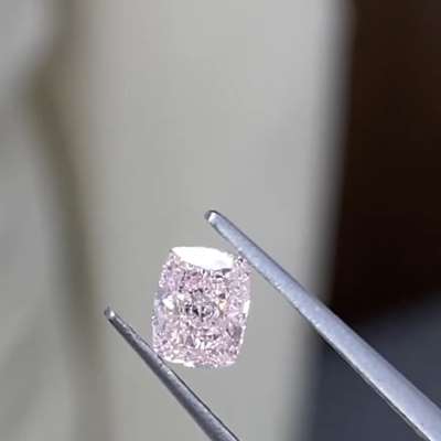 0.41ct GIA Natural Fancy Light Orangy Pink colour SI1 clarity Cushion shaped diamond