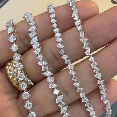  natural EF Color VVS-VS Clarity Mix Shape white diamonds in 18k white gold.