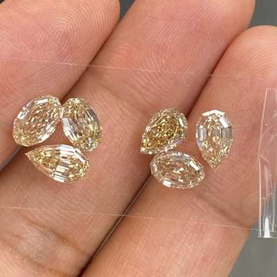 6pcs total = 6.25cts. 1ct each, VS-SI clarity, Natural Peachy & Champagne Brown Step Cut Diamond Layout.  