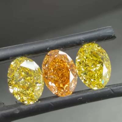 GIA Certified Natural Fancy Vivid Yellow Match Pair & Natural Fancy Intense Yellow Orange Oval Shape Diamond 