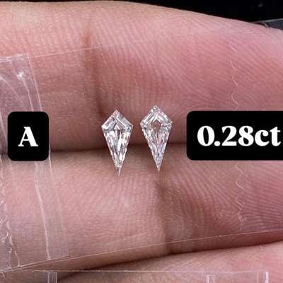 0.28ct total weight (two matched stones)Natural F Color VVS2 Clarity  Precision-cut kites—sharp angles, bold sparkle