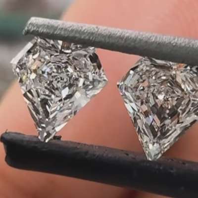 Matching Pair of 0.62ct Superman-Shaped Diamonds, F-color, VVS2-clarity diamonds—