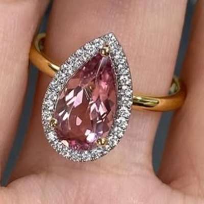 Lovely Natural Pink Tourmaline Gemstones set with White round diamonds in 18 K Gold rings