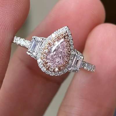 GIA Natural Fancy Light Orangy pink VS1 Pear diamond set in 18 K gold ring