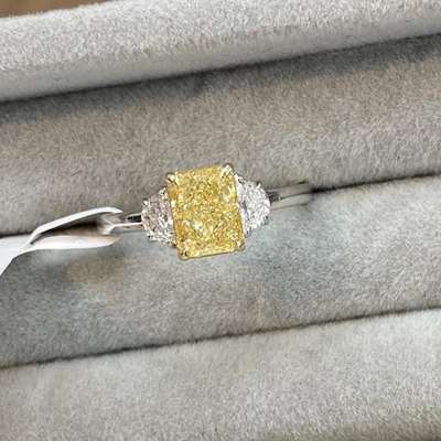 1.63ct GIA Certified Natural Light Yellow (y to z range) VS1 Clarity Radiant Cut Diamond Along With 0.38ct Total Weight EF Color VVS-VS Clarity Half-moon Shape Diamonds set In 18k Gold.